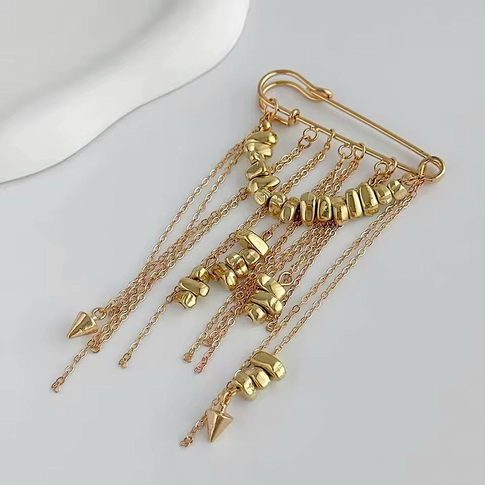Broche Nadua