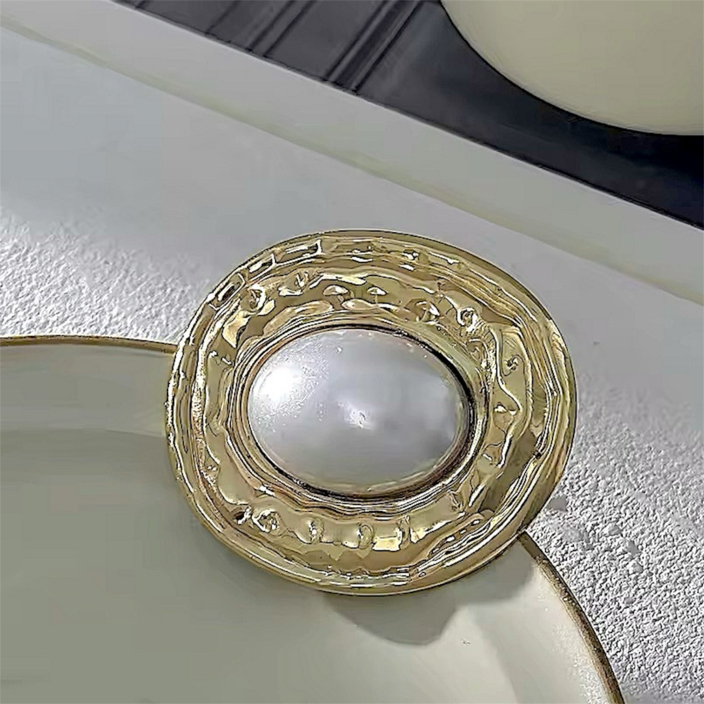 Broche Aura