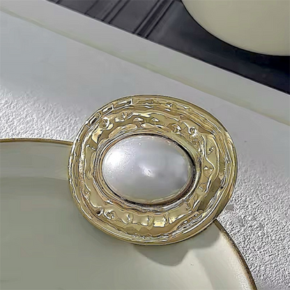 Broche Aura
